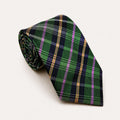 A rolled George Neale green and pink plaid silk tie.
