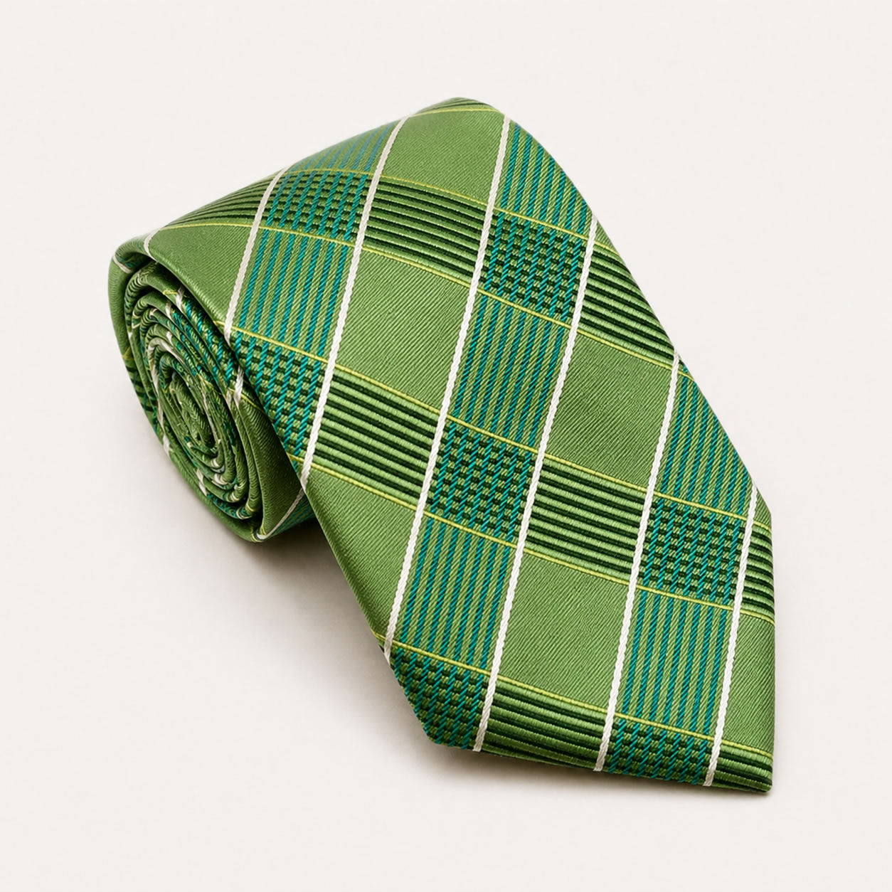 A rolled George Neale green and white plaid silk tie.