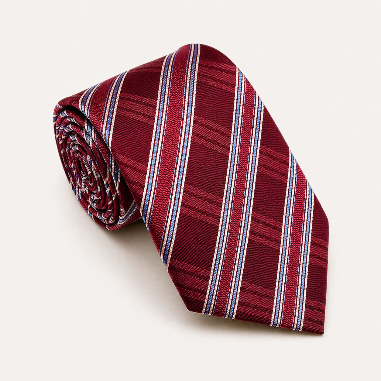 A rolled George Neale maroon and light blue plaid silk tie.