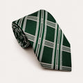 A rolled George Neale dark green and silver plaid silk tie.