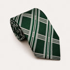 A rolled George Neale dark green and silver plaid silk tie.