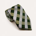 A rolled George Neale green and silver plaid silk tie.