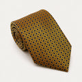 A rolled George Neale gold and black plaid silk tie.