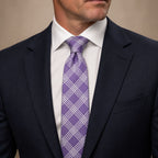 Mauve and White Plaid Silk Tie by George Neale, worn by a model with a suit and shirt
