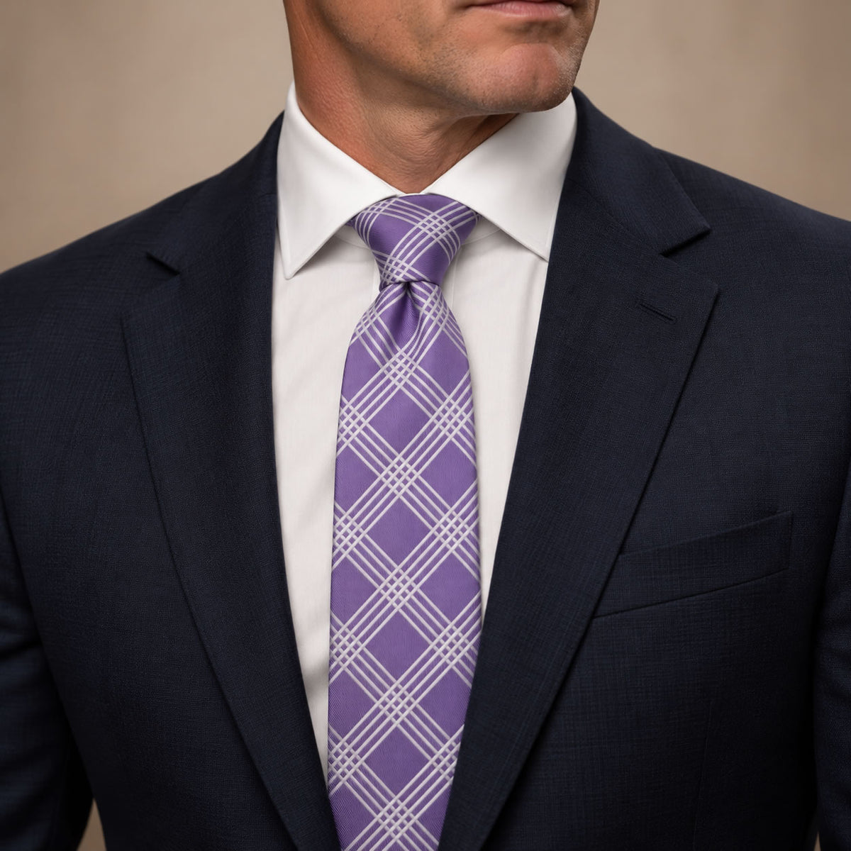 Mauve and White Plaid Silk Tie by George Neale, worn by a model with a suit and shirt