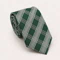 A rolled George Neale green and silver plaid silk tie.