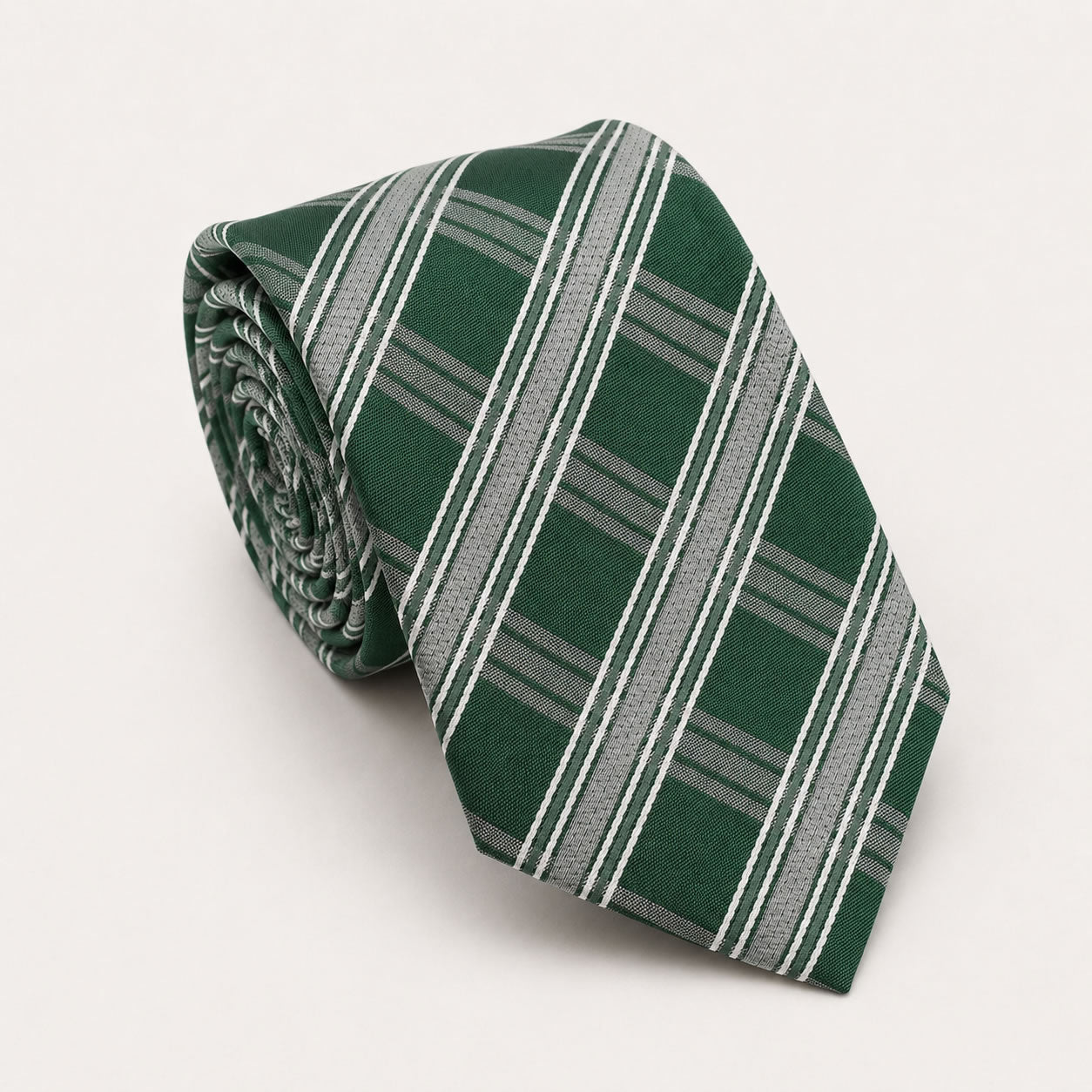 A rolled George Neale green and silver plaid silk tie.
