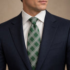 Green and Silver Plaid Silk Tie by George Neale, worn by a model with a suit and shirt