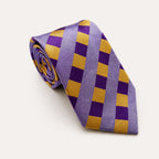 A rolled George Neale purple and gold plaid silk tie.