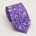 A rolled George Neale purple and silver floral silk tie.