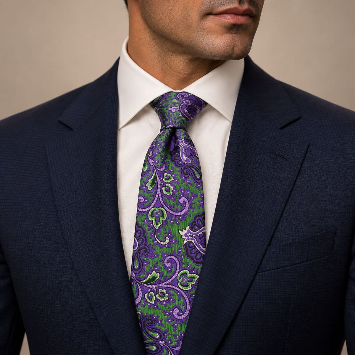 Green and Purple Floral Silk Tie by George Neale, worn by a model with a suit and shirt