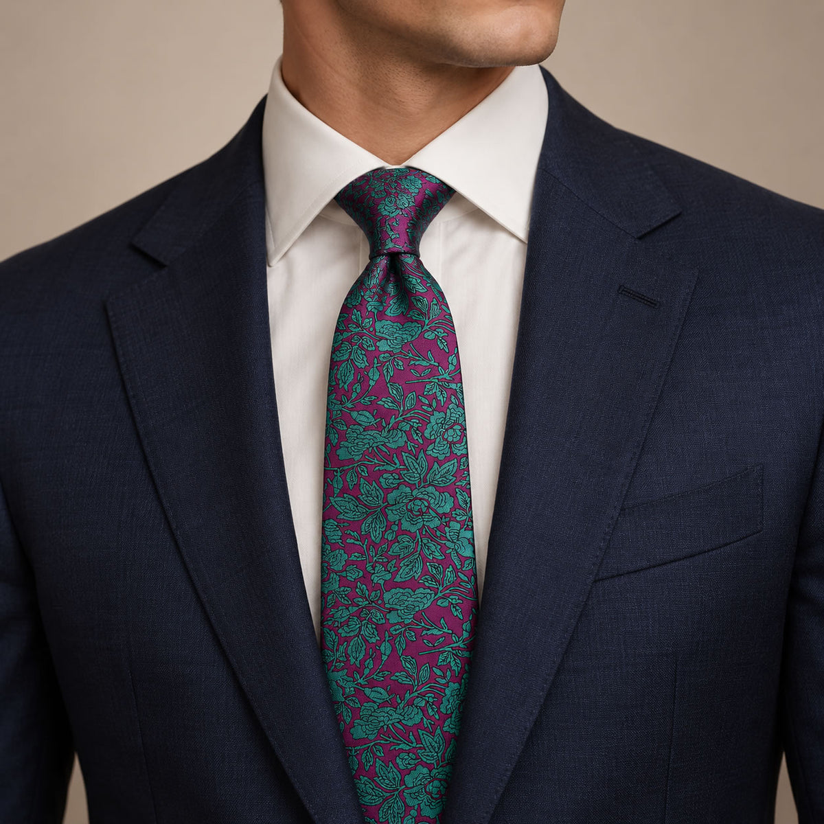 Purple and Turquoise Floral Silk Tie by George Neale, worn by a model with a suit and shirt