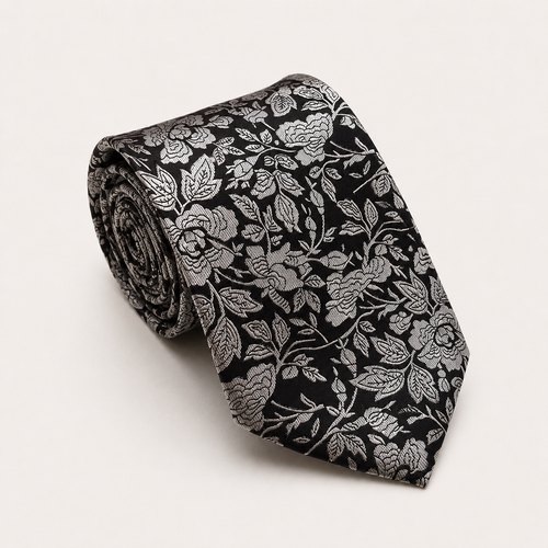 A rolled George Neale black and silver floral silk tie.