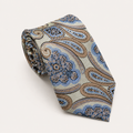 A rolled George Neale champagne and blue floral silk tie.