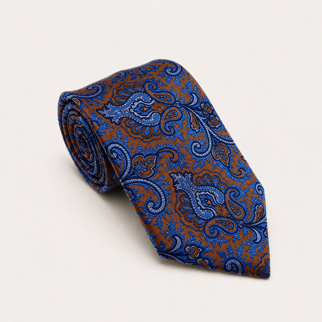 A rolled George Neale brown and blue floral silk tie.
