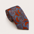 A rolled George Neale rust red and light blue floral silk tie.