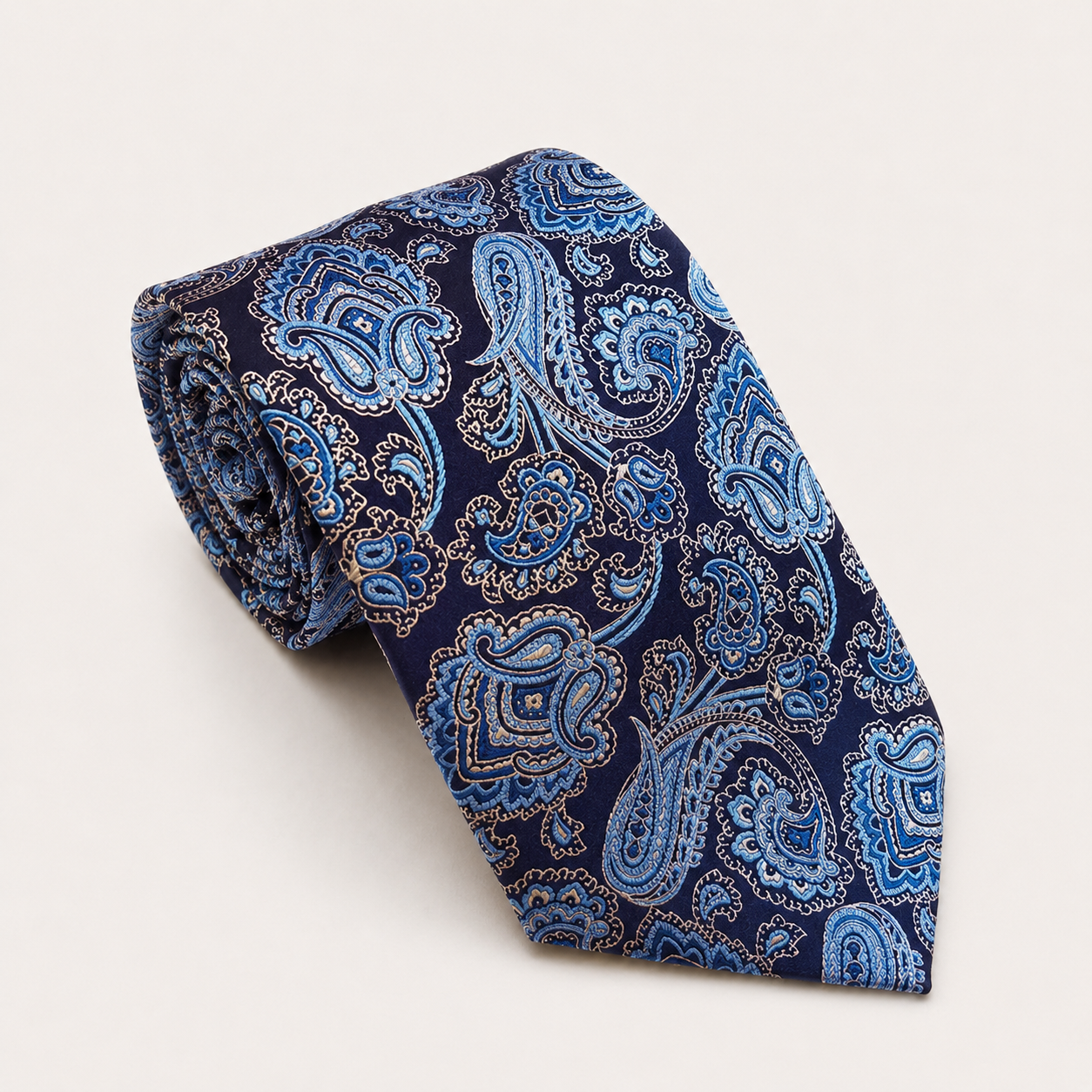 A rolled George Neale navy and light blue floral silk tie.