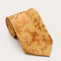 A rolled George Neale champagne floral silk tie.