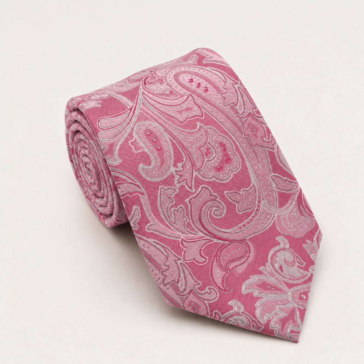 A rolled George Neale hot pink floral silk tie.