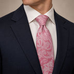 Hot Pink Floral Silk Tie by George Neale, worn by a model with a suit and shirt