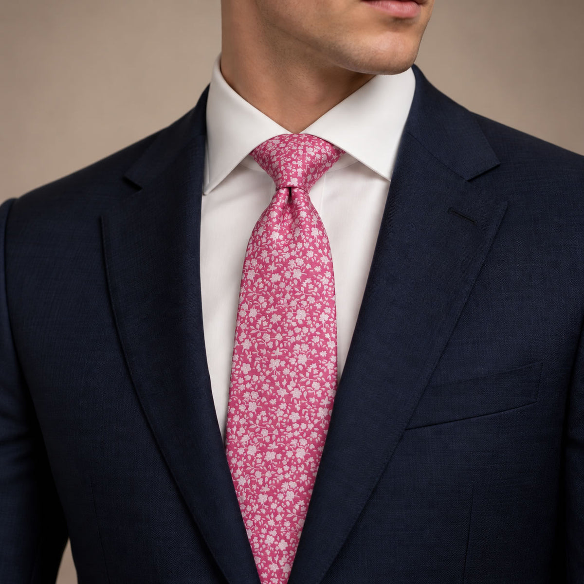 Hot Pink Floral Silk Tie by George Neale, worn by a model with a suit and shirt