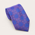 A rolled George Neale purple and blue patterned silk tie.