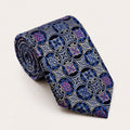 A rolled George Neale silver and blue patterned silk tie.
