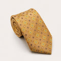 A rolled George Neale camel patterned silk tie.