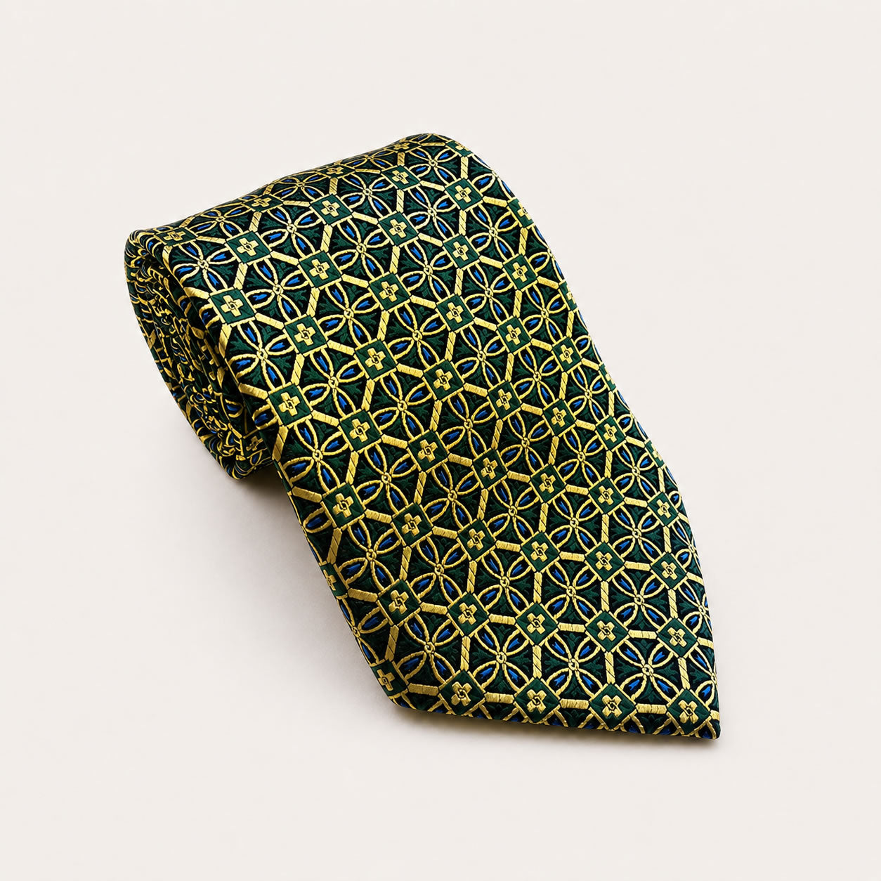A rolled George Neale green and gold patterned silk tie.