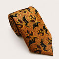 A rolled George Neale black and bronze patterned silk tie.