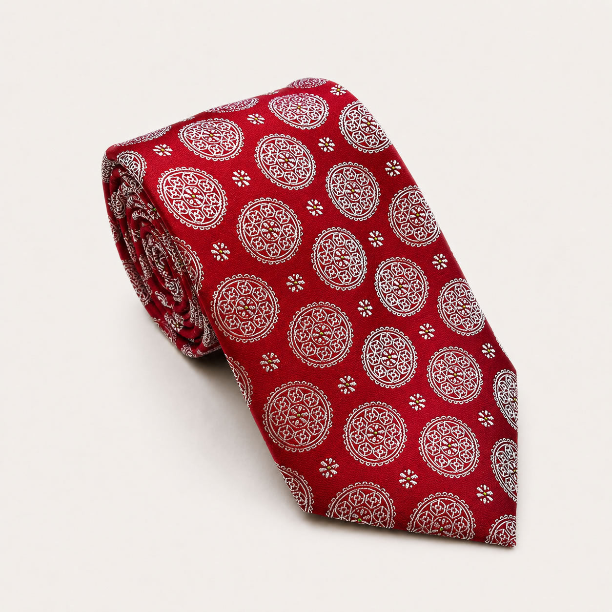 A rolled George Neale red patterned silk tie.