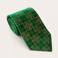 A rolled George Neale green and copper patterned silk tie.