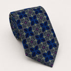 A rolled George Neale navy and sage green patterned silk tie.