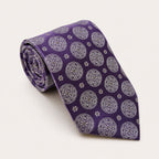 A rolled George Neale purple patterned silk tie.