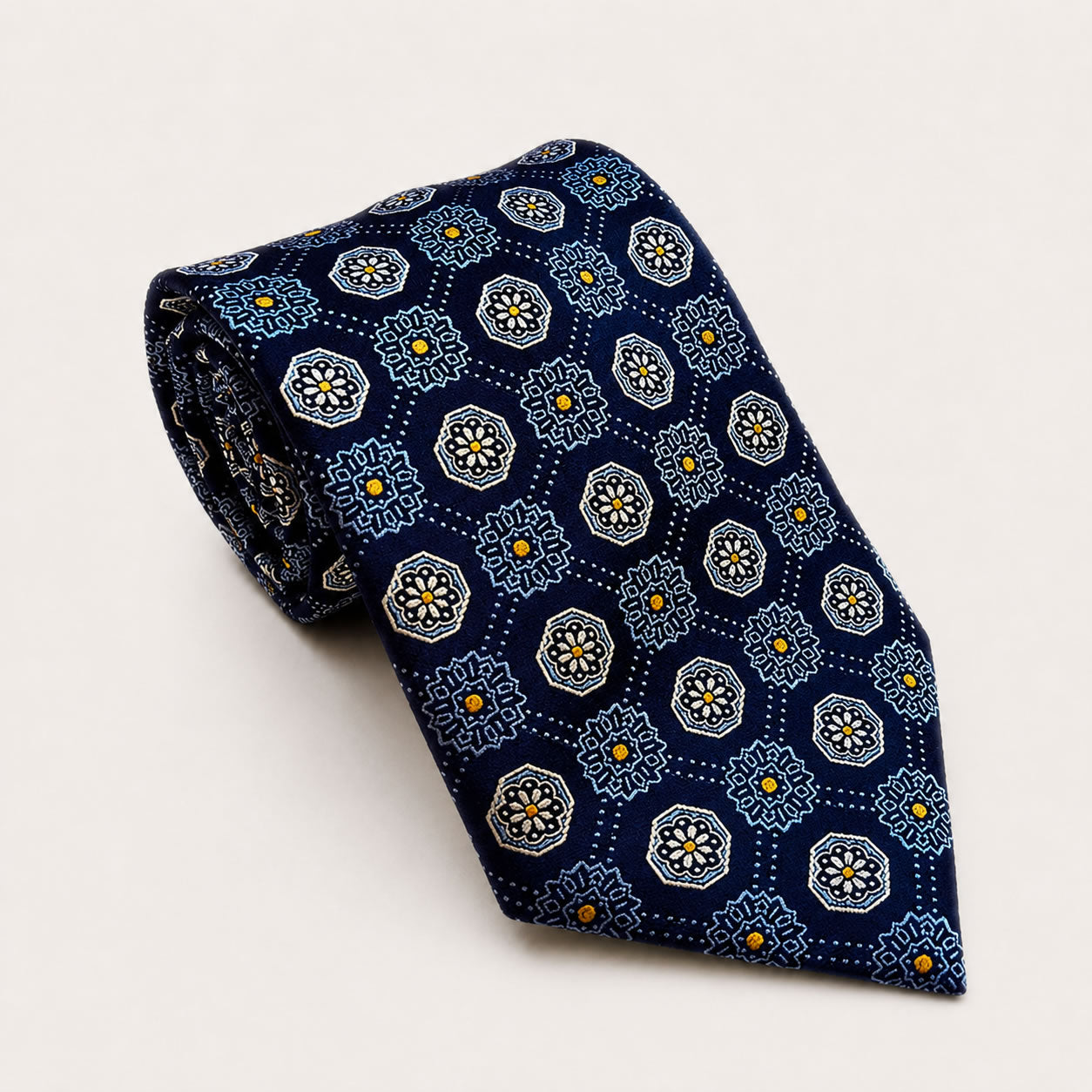 A rolled George Neale navy patterned silk tie.