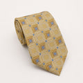 A rolled George Neale gold and blue patterned silk tie.