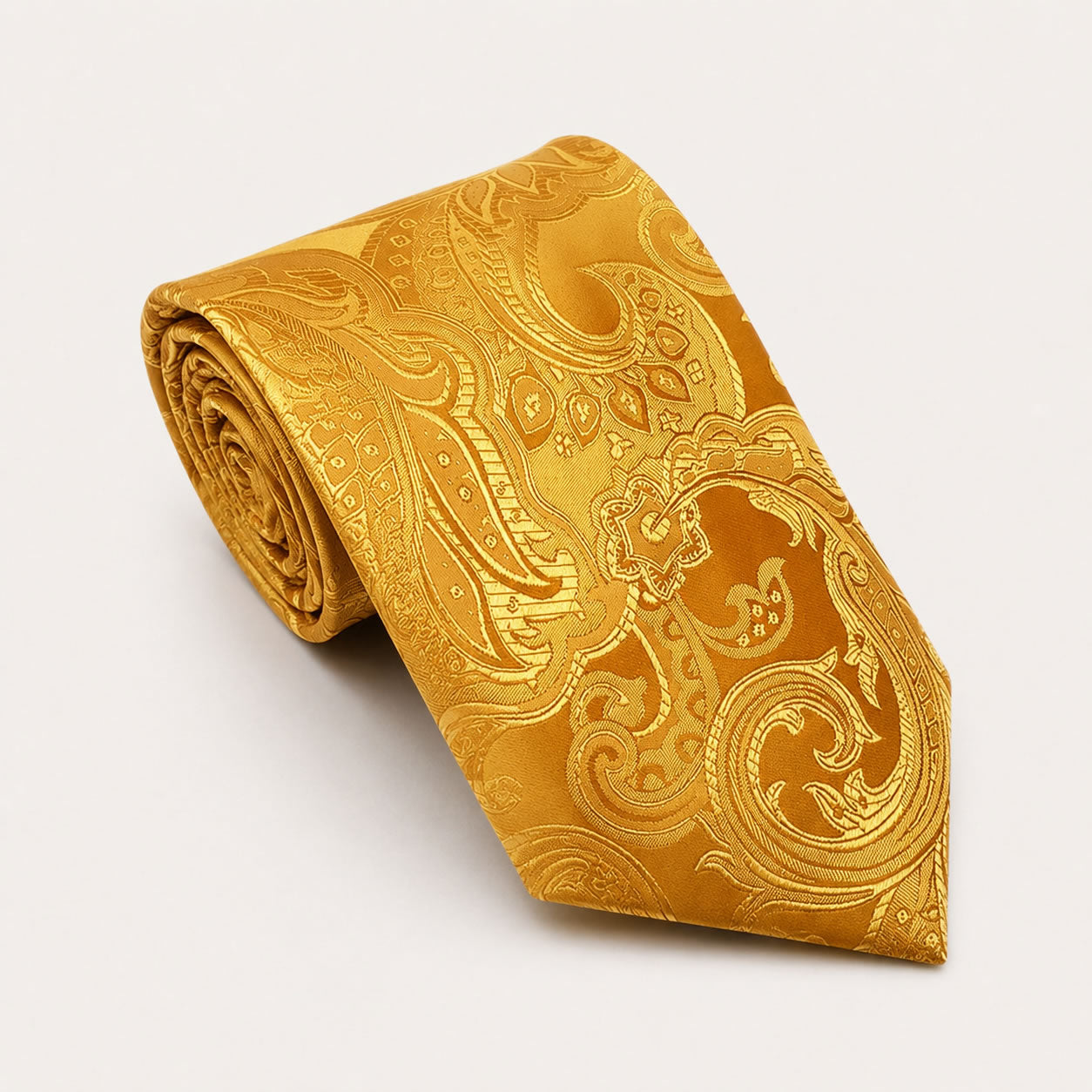 A rolled George Neale gold patterned silk tie.