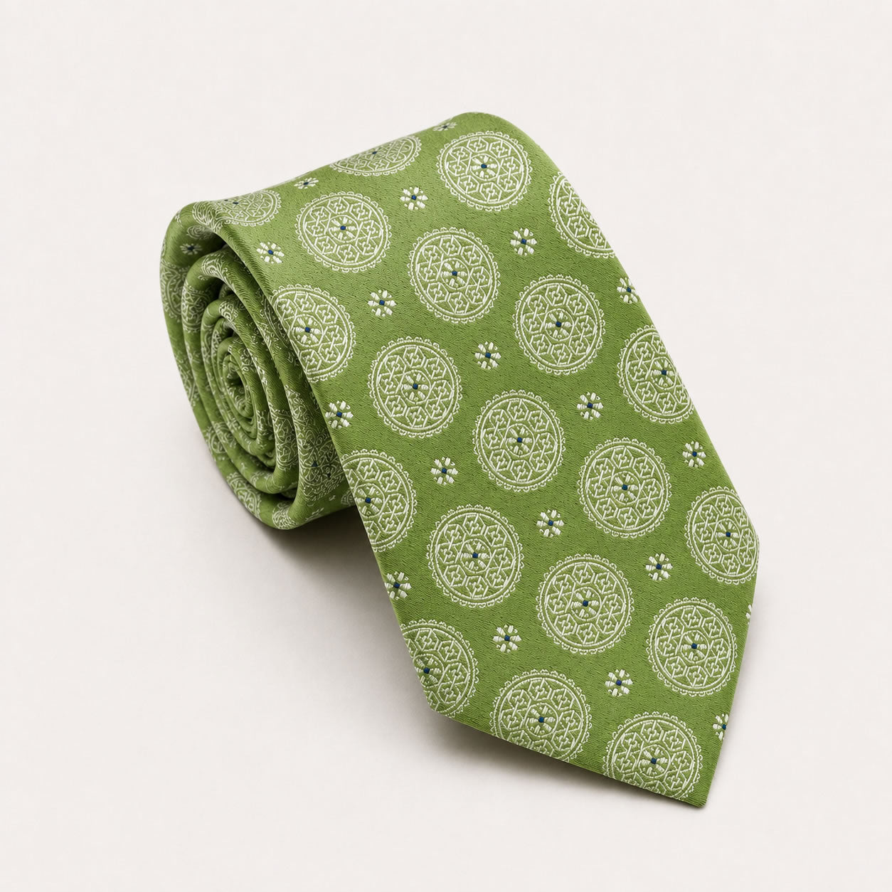 A rolled George Neale olive patterned silk tie.