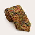 A rolled George Neale gold and red paisley silk tie.