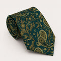 A rolled George Neale teal and gold paisley silk tie.