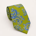 A rolled George Neale lime green and blue paisley silk tie.