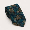 A rolled George Neale blue and brown paisley silk tie.