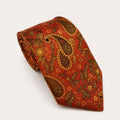 A rolled George Neale orange and brown paisley silk tie.
