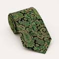 A rolled George Neale black and green paisley silk tie.