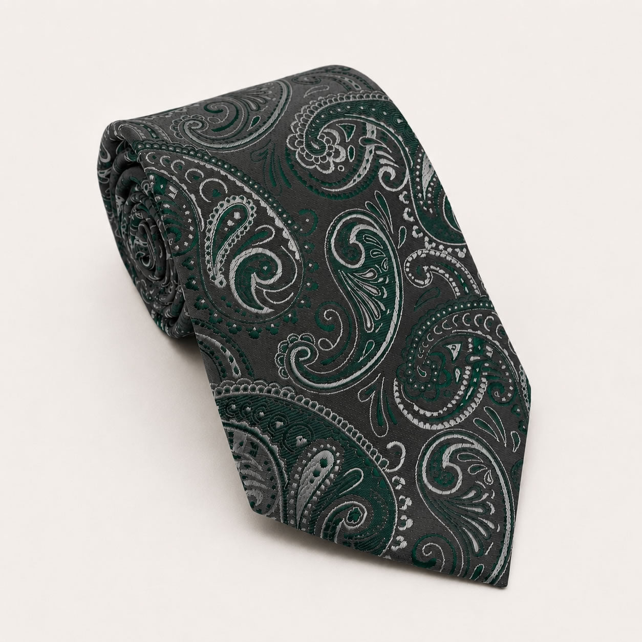 A rolled George Neale slate and green paisley silk tie.
