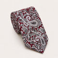 A rolled George Neale maroon and silver paisley silk tie.