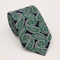 A rolled George Neale navy and green paisley silk tie.