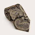 A rolled George Neale black and champagne paisley silk tie.