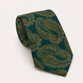A rolled George Neale green and gold paisley silk tie.