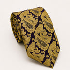 A rolled George Neale purple and gold paisley silk tie.